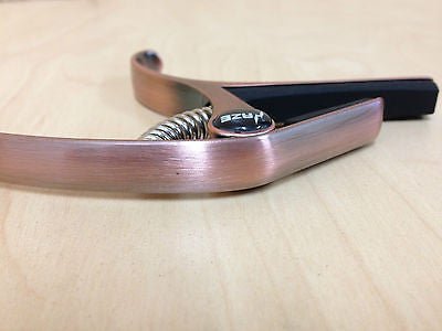 Haze DC06B Top Grade Zinc Alloy Acoustic/Classical Guitar Capo - Bronze + 3 Free Picks