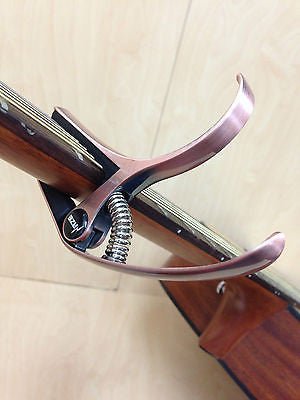 Haze DC06B Top Grade Zinc Alloy Acoustic/Classical Guitar Capo - Bronze + 3 Free Picks